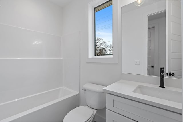 full bathroom with vanity, shower / bathing tub combination, and toilet