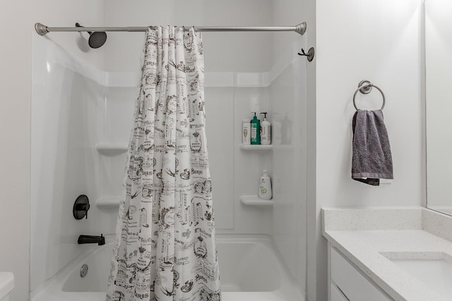 bathroom featuring vanity and shower / bathtub combination with curtain