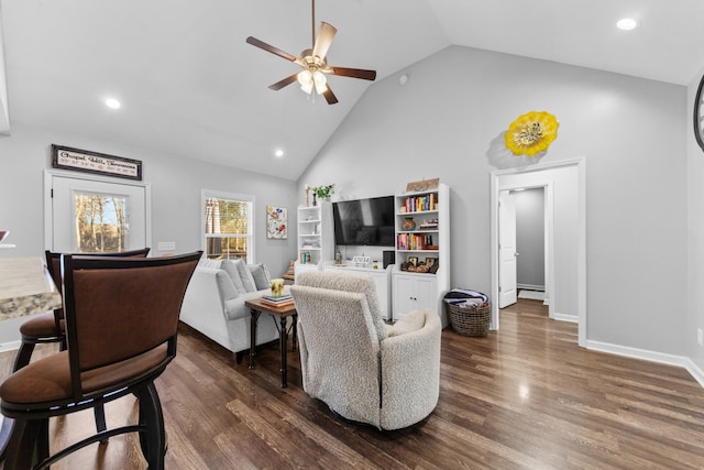 living room with dark hardwood / wood-style flooring, high vaulted ceiling, and ceiling fan