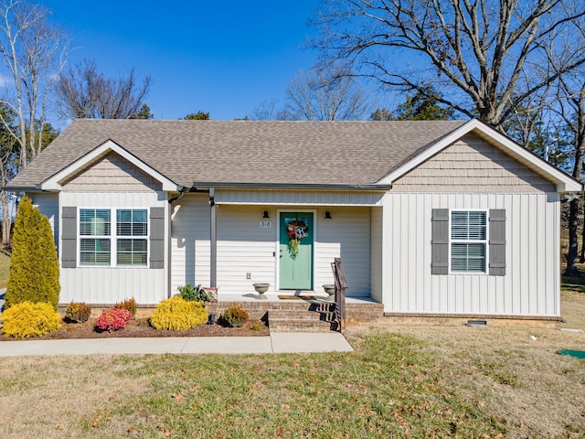 single story home with a front yard