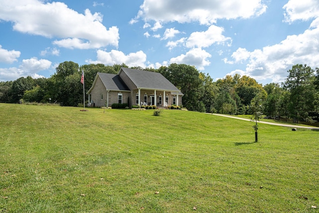 new england style home with a front yard