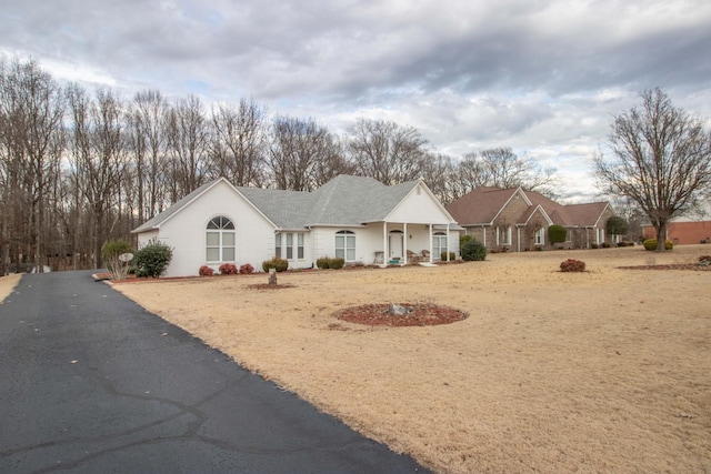 ranch-style house with a porch