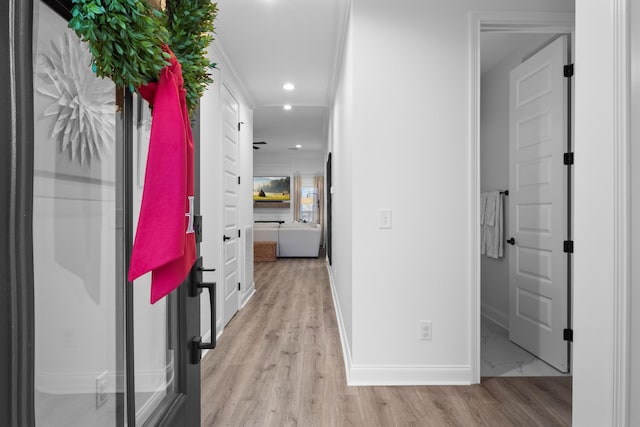 corridor featuring light hardwood / wood-style floors