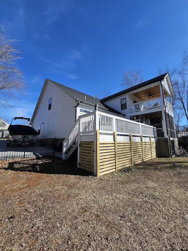 view of home's exterior featuring ceiling fan