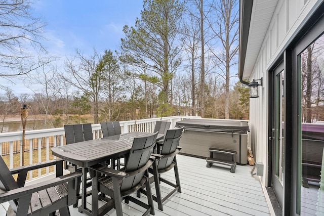 deck featuring a hot tub