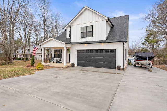 modern farmhouse style home featuring a garage and covered porch