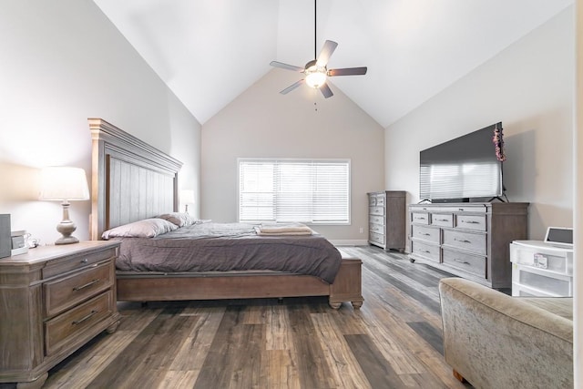 bedroom featuring dark hardwood / wood-style flooring, high vaulted ceiling, and ceiling fan