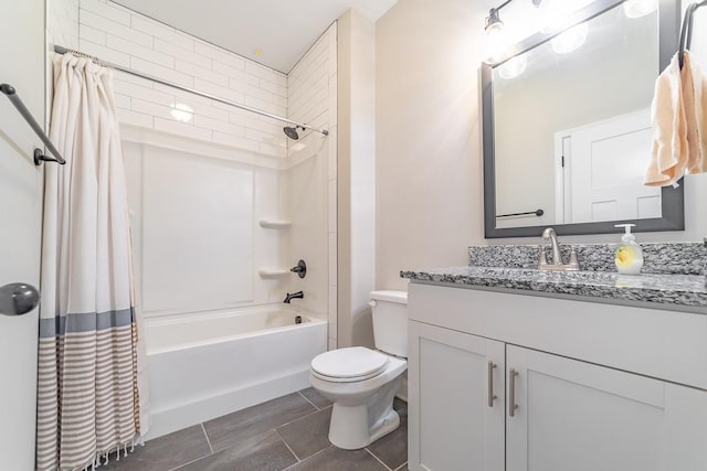 full bathroom with tile patterned flooring, vanity, toilet, and shower / bath combo with shower curtain