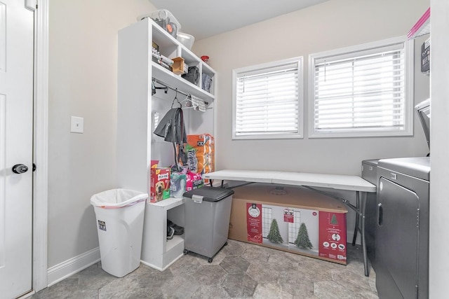 washroom with washing machine and dryer