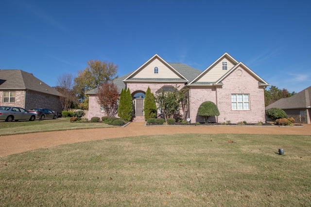 view of front of home with a front yard