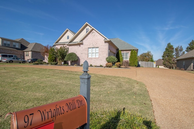 view of front of house with a front lawn