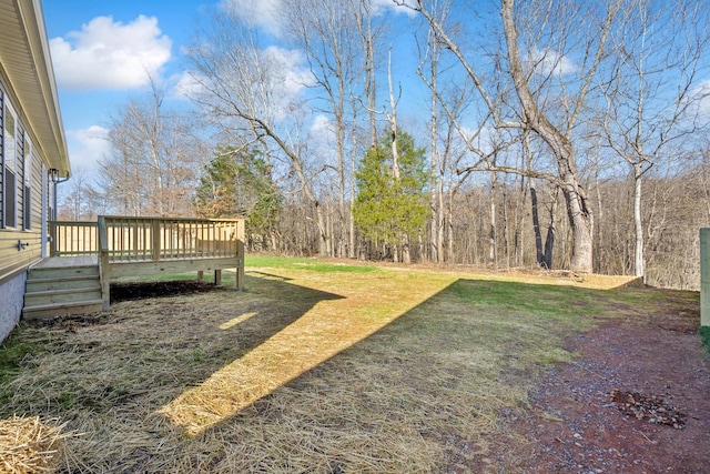 view of yard with a deck