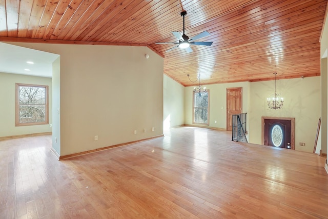 unfurnished living room featuring lofted ceiling, wood ceiling, ceiling fan with notable chandelier, and light wood-type flooring