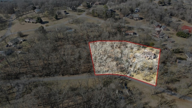 birds eye view of property featuring a rural view