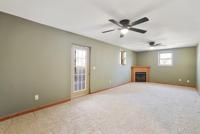 unfurnished living room with carpet floors