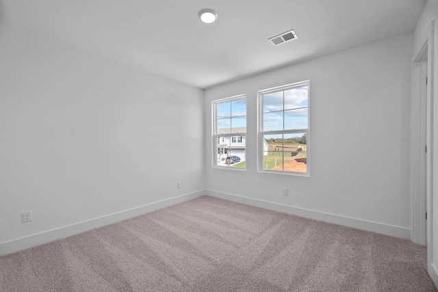 empty room featuring carpet floors