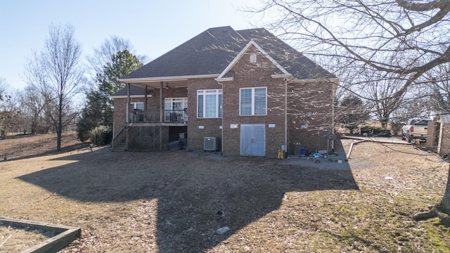 back of property featuring central AC unit