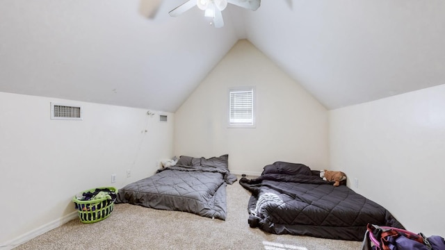 bedroom featuring ceiling fan, lofted ceiling, and carpet floors