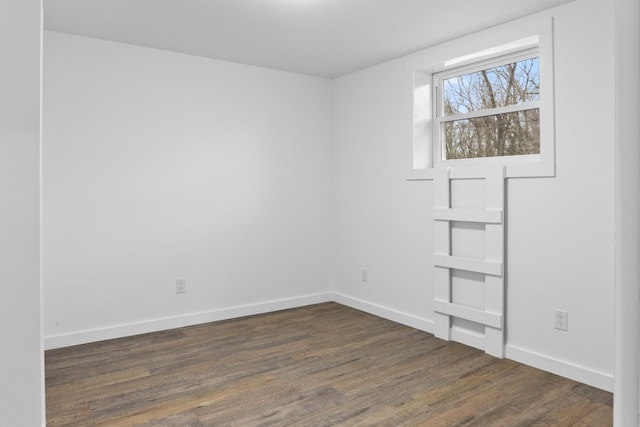 empty room featuring dark hardwood / wood-style floors