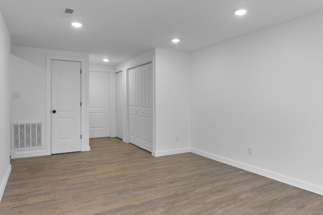 empty room featuring hardwood / wood-style floors