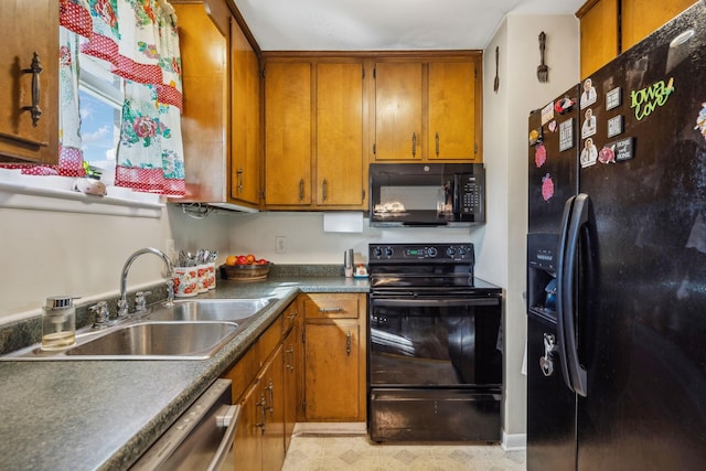 kitchen featuring sink and black appliances