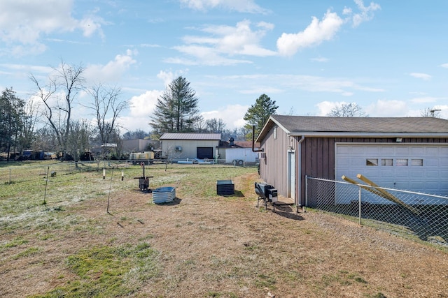 view of yard with a garage