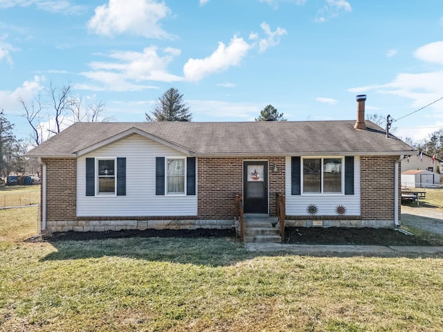 view of front facade with a front yard