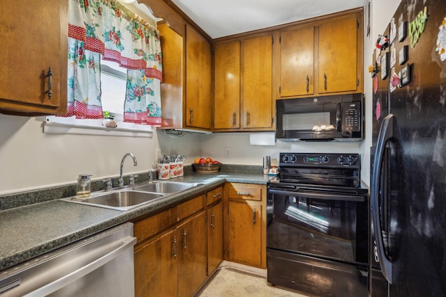 kitchen with sink and black appliances