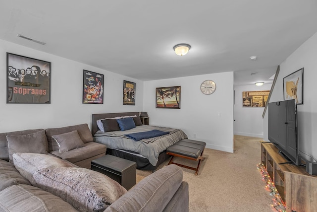 bedroom with light colored carpet