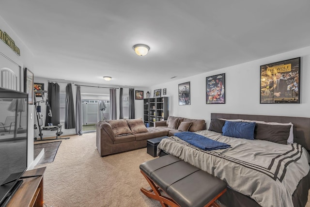 bedroom with light carpet