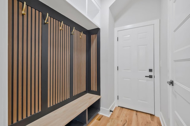 mudroom with hardwood / wood-style floors