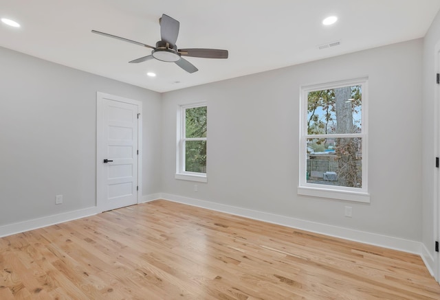 unfurnished room featuring light hardwood / wood-style floors and ceiling fan