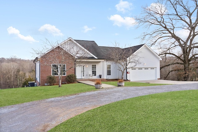 view of front facade with a garage and a front lawn