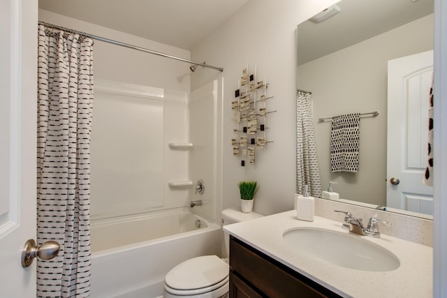 full bathroom with vanity, toilet, and shower / tub combo