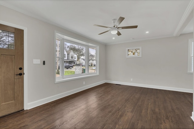 entryway featuring dark hardwood / wood-style flooring, crown molding, and ceiling fan