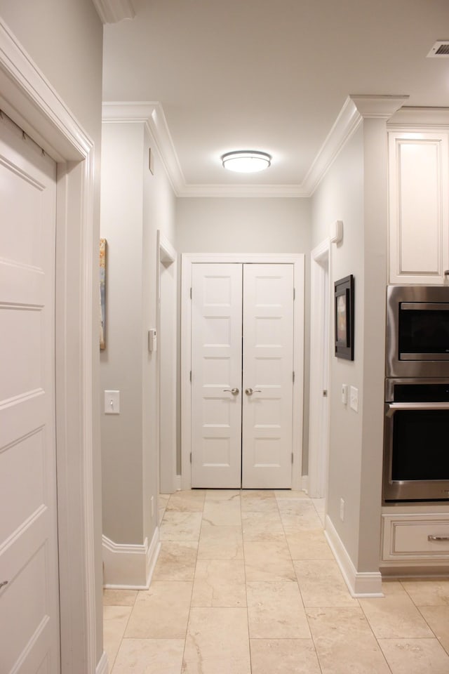 corridor with crown molding