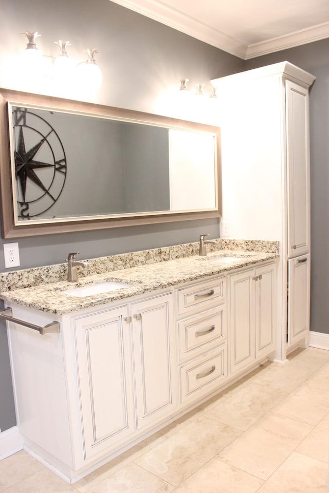 bathroom featuring vanity and ornamental molding