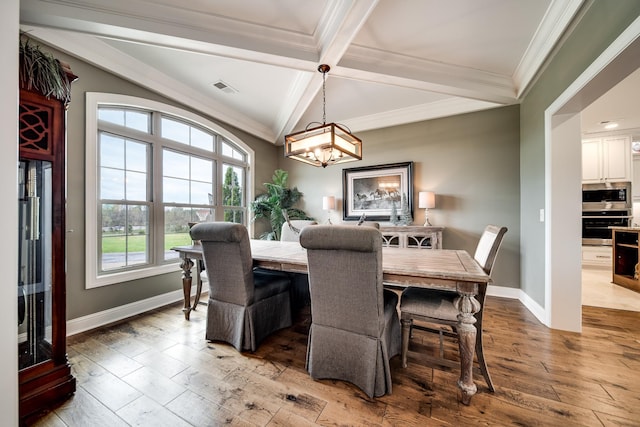 4888 Rock House Rd, Portland, TN 37148 - dining space featuring light wood-style floors, crown molding, visible vents, a chandelier, and baseboards