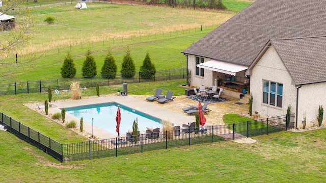 4888 Rock House Rd, Portland, TN 37148 - view of swimming pool with a rural view, a yard, a patio area, fence, and a fenced in pool