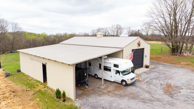 4888 Rock House Rd, Portland, TN 37148 - view of pole building featuring driveway