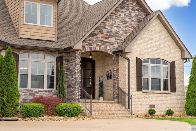 4888 Rock House Rd, Portland, TN 37148 - entrance to property with crawl space, stone siding, and a shingled roof