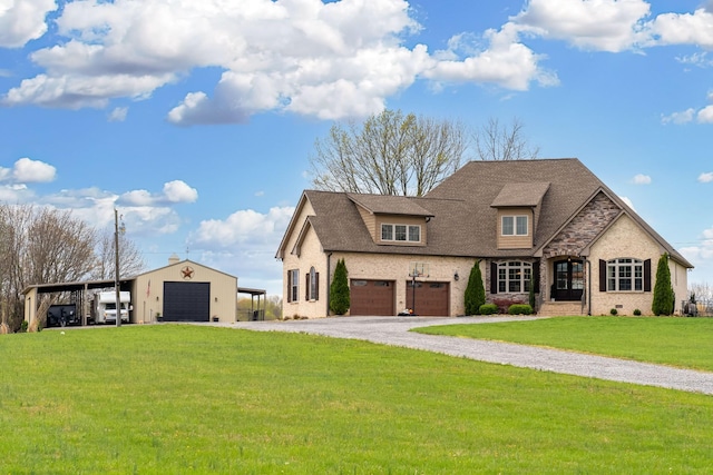 4888 Rock House Rd, Portland, TN 37148 - view of front of house with a front yard, driveway, stone siding, and a shingled roof