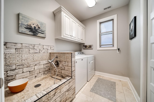 4888 Rock House Rd, Portland, TN 37148 - laundry area featuring independent washer and dryer, baseboards, and visible vents