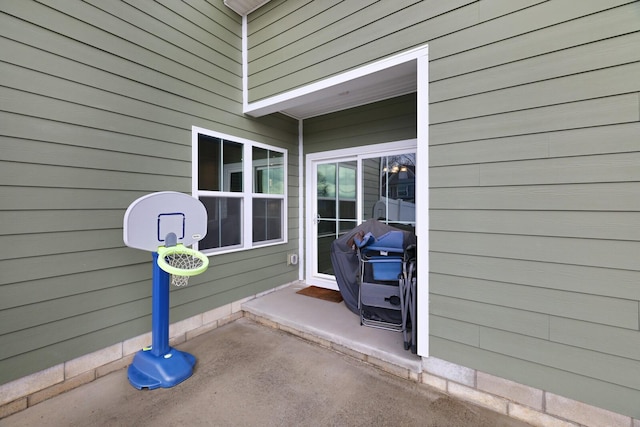 doorway to property featuring a patio