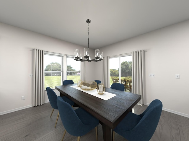 dining space with dark hardwood / wood-style floors and a chandelier