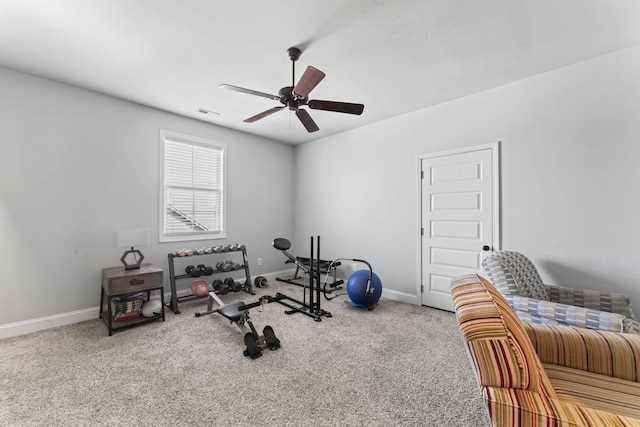 workout area featuring ceiling fan and carpet floors