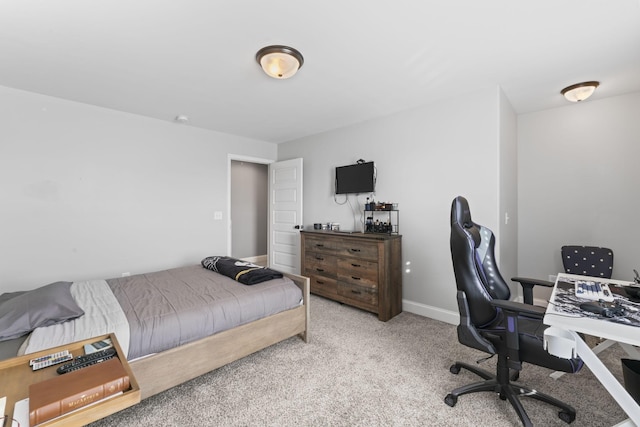 bedroom featuring light colored carpet