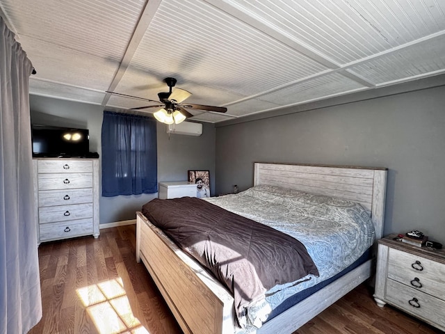 bedroom featuring ceiling fan, dark hardwood / wood-style flooring, and an AC wall unit