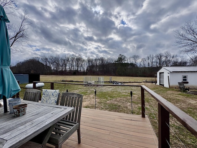 wooden deck featuring a shed