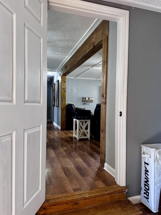 hall with dark hardwood / wood-style floors